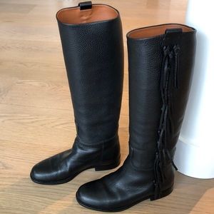 Valentino black leather fringed knee-hi boots.